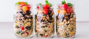 Quinoa and vegetable dinners in mason jars